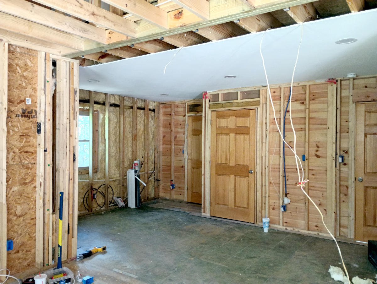Drywall and flooring installation during a whole-home remodeling project in East Texas