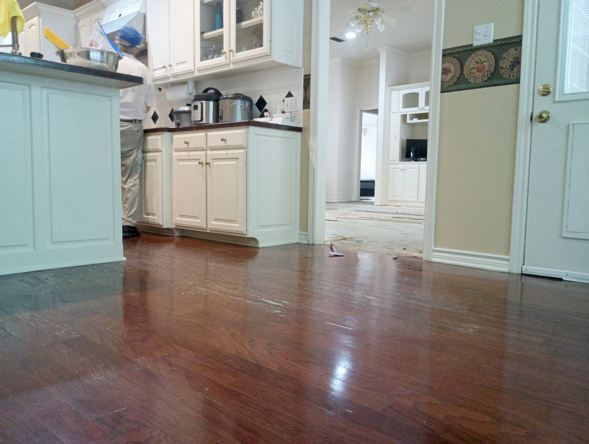 Old flooring before a home remodeling project in East Texas
