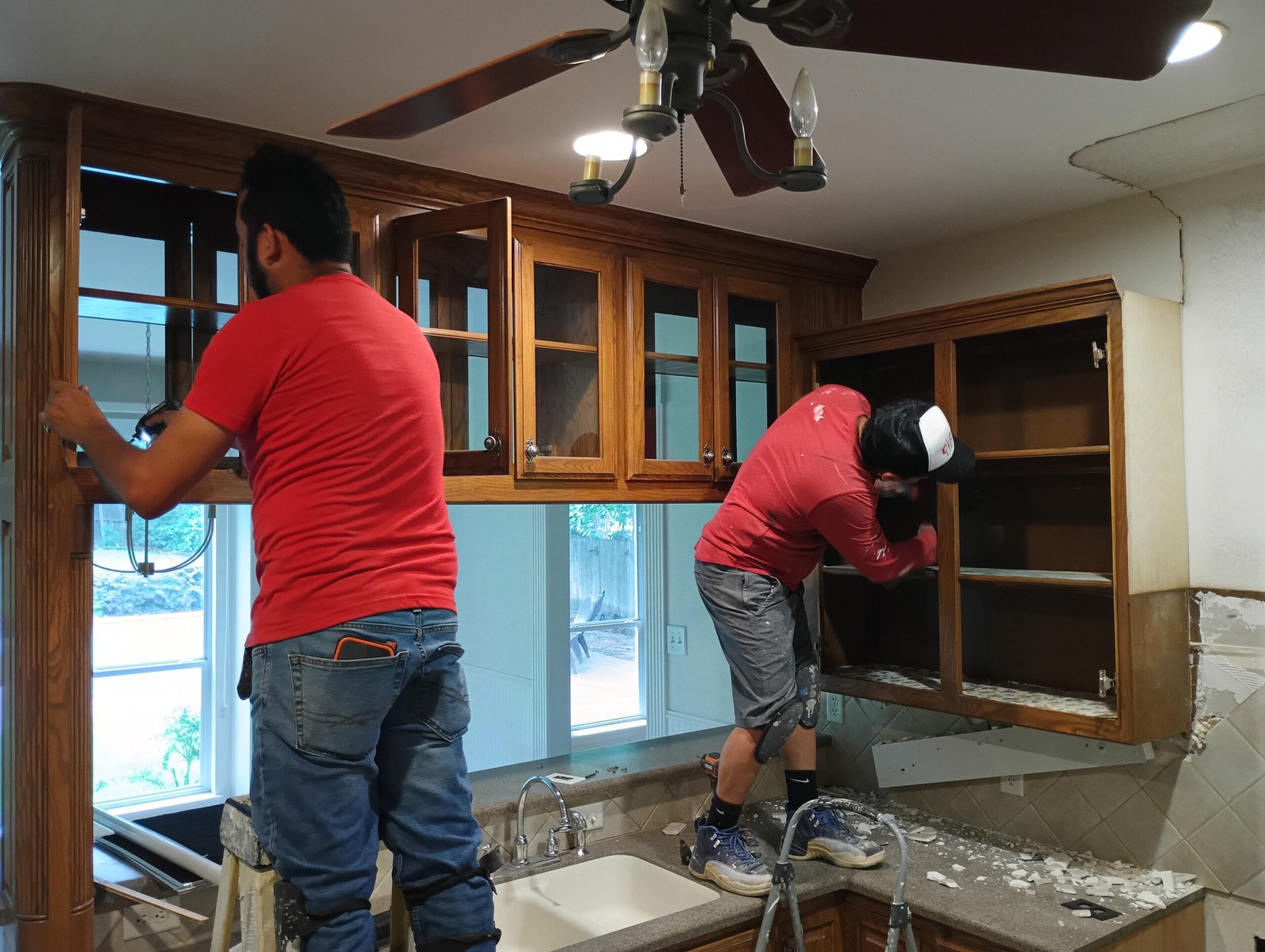 Kitchen cabinet dismantling during a kitchen remodeling project in Tyler, TX